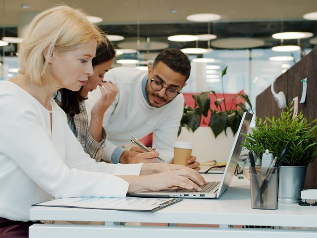 The FreeSoftwareX team reviewing a software listing
